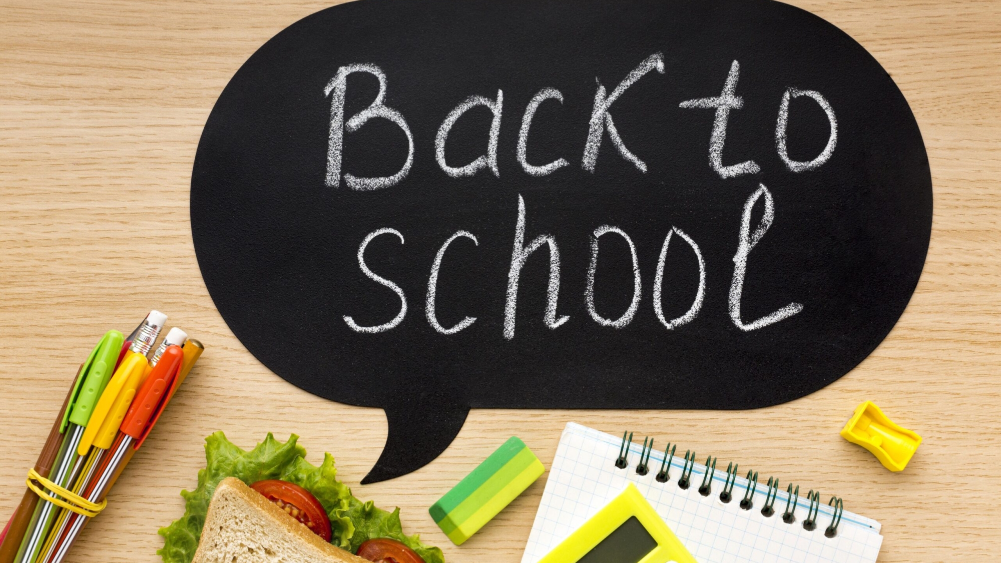 flat-lay-school-essentials-with-sandwich-notebook